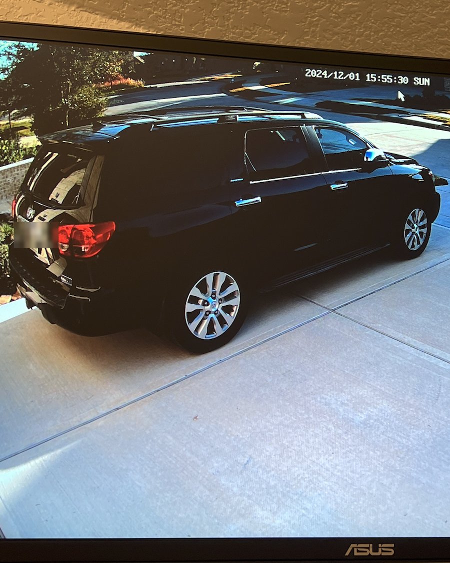 Driveway surveillance footage from a camera system installed by StarCat Technologies